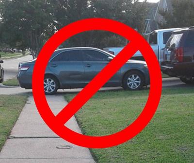 City Reminds Residents Against Parking On Sidewalks, Too Close to Crosswalks