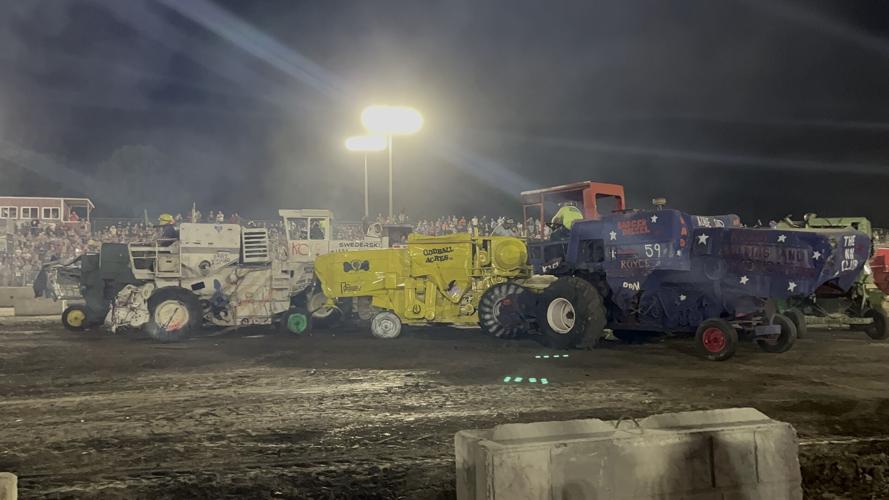 Fairgoers flock to the truck and tractor pulls and stay for combine