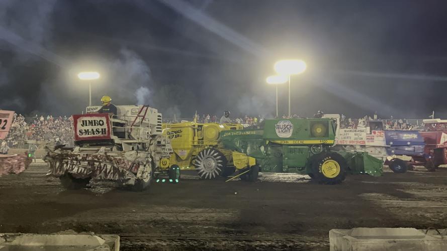 Fairgoers flock to the truck and tractor pulls and stay for combine