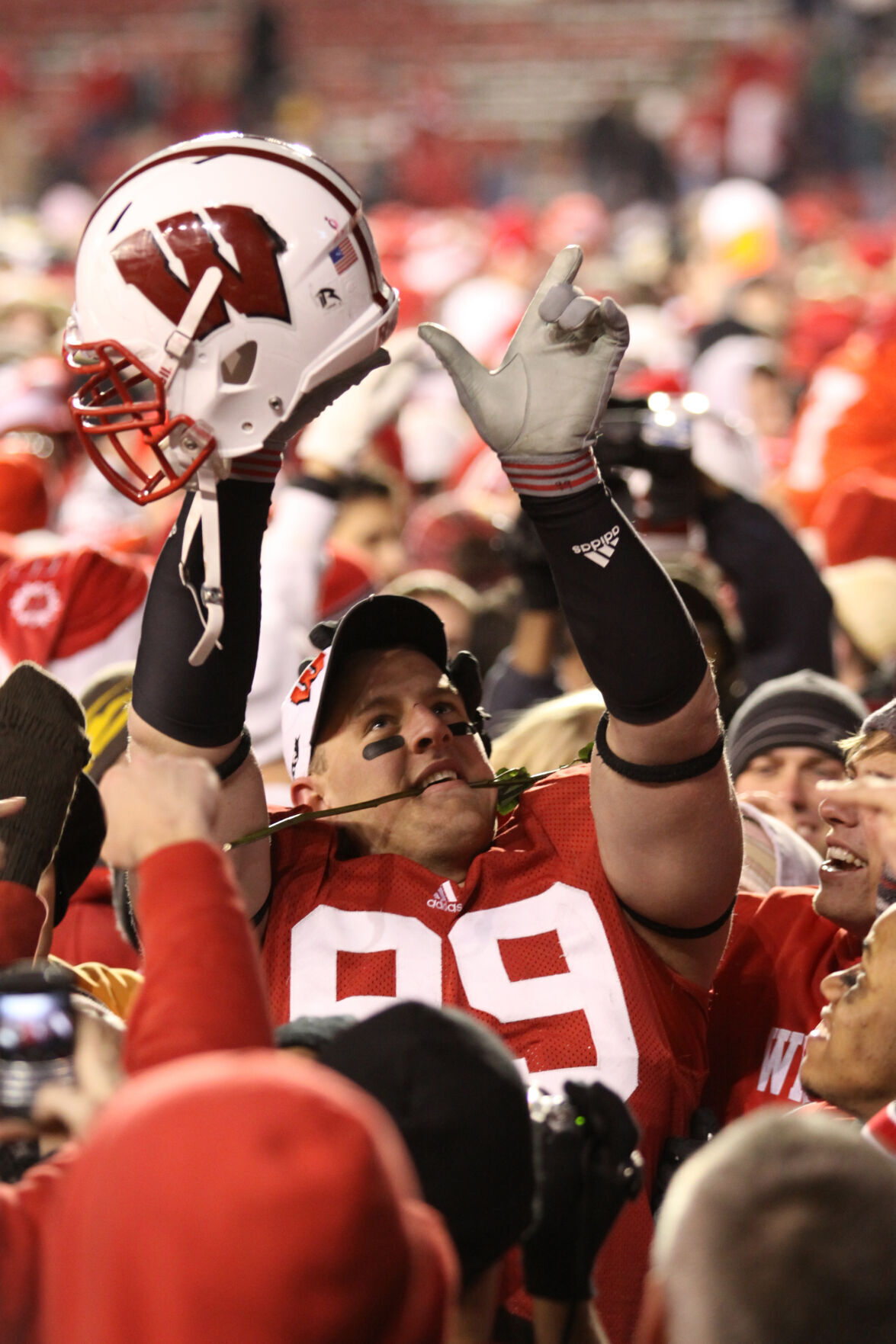 Wisconsin defensive tackle J.J. Watt #99 looks on during the game between  the Wisconsin Badgers and the Hawaii Warriors being played at Aloha Stadium  in Honolulu, Hawaii. The Wisconsin Badgers defeated the