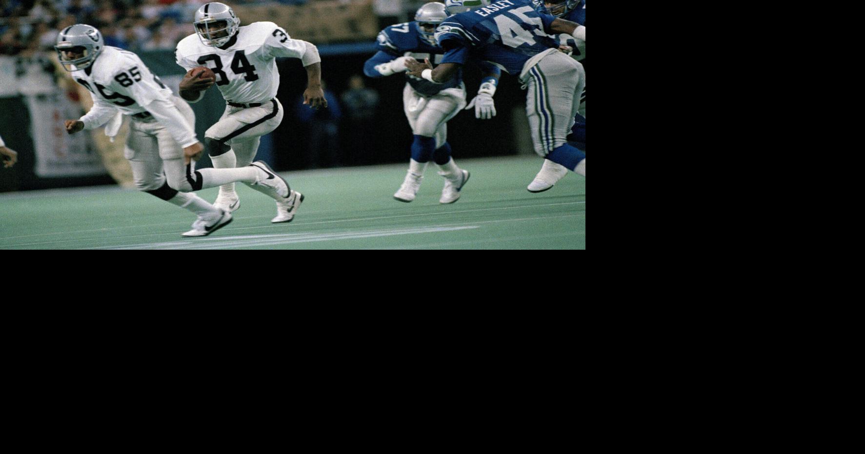 Los Angeles Raiders Bo Jackson takes a breath on the bench after a 91-yard  touchdown run in the second quarter of the game against the Seahawks in  Seattle, Nov. 30, 1987. Jackson