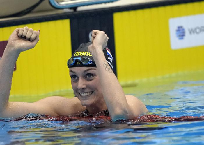 Mollie O'Callaghan overcomes injury to set new world record at swimming  world championships