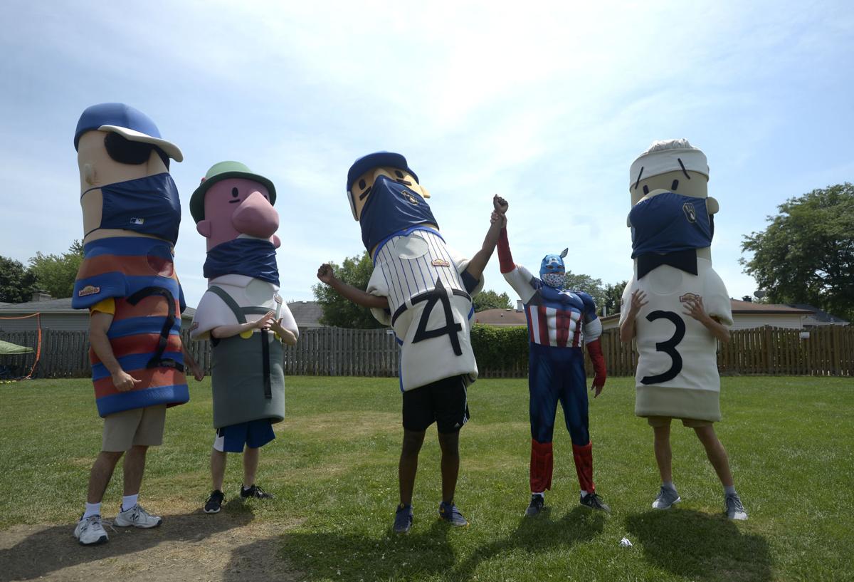 Three Johnsonville Racing Sausages take a fall during Tuesday's race