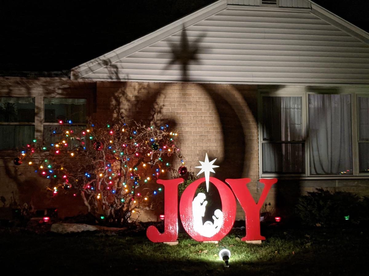 2020 xmas lights joy sign on 79th street.jpg