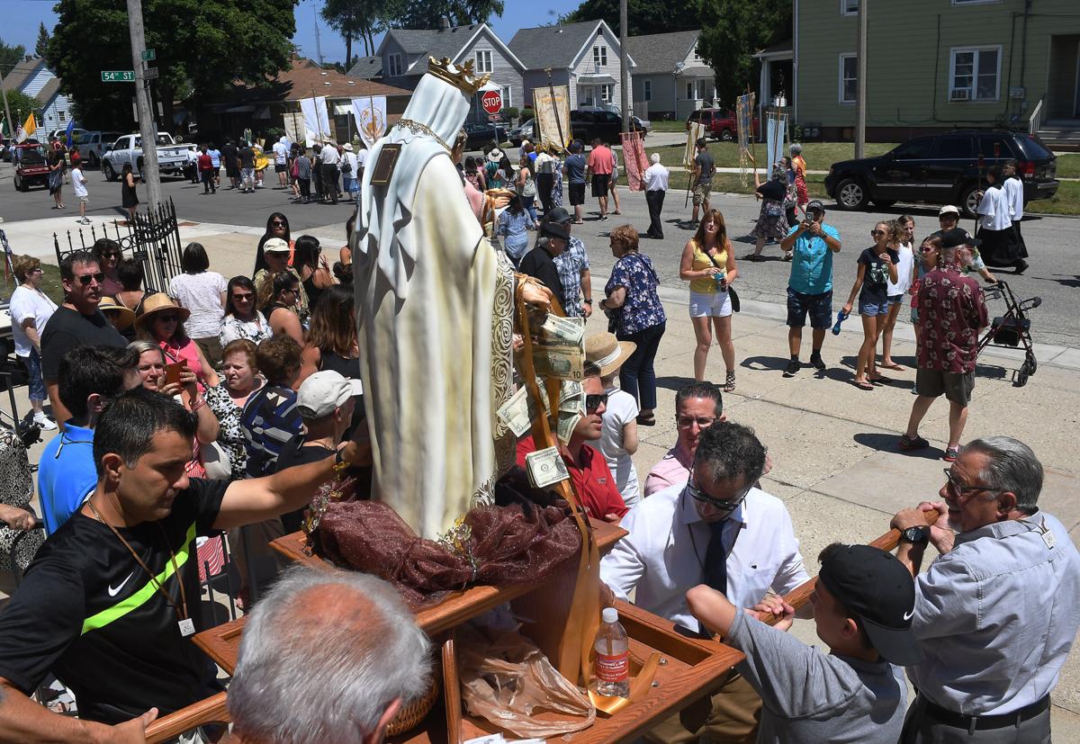 Procession recalls Catholic feast, Italian tradition and unity Local