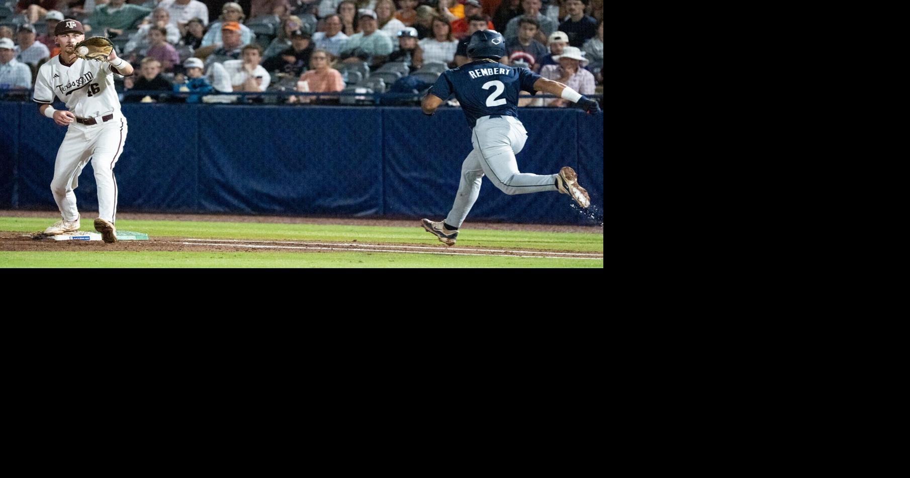 Texas A&M Aggies' Bear Harrison (16) catches the ball at first base to force out Auburn Tigers' Chris Rembert (2) as Auburn Tigers take on Texas A&M Aggies during the SEC baseball tournament at Hoover Metropolitan Stadium in Hoover, Ala. on Friday,