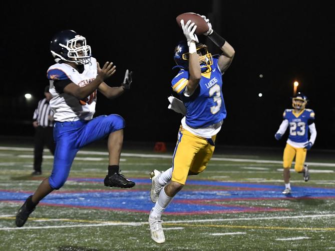 High school football roundup Lancers continue their perfect start to