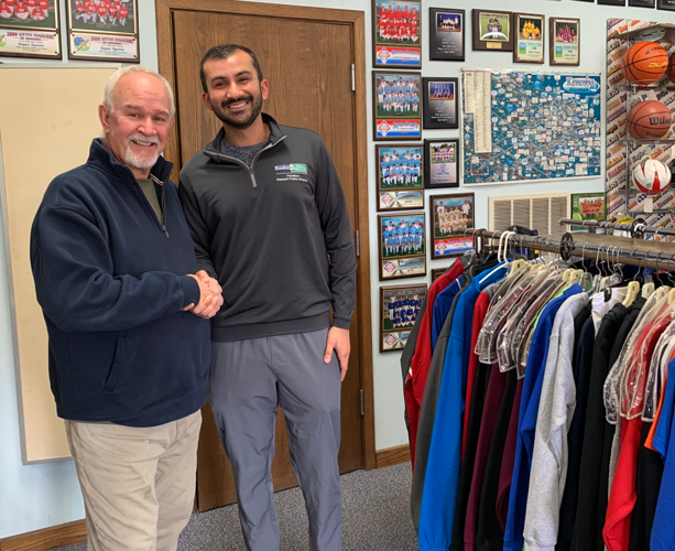 Brian Portilia and Dr. Syed Mehdi, Orthopedic Spine Surgeon.png