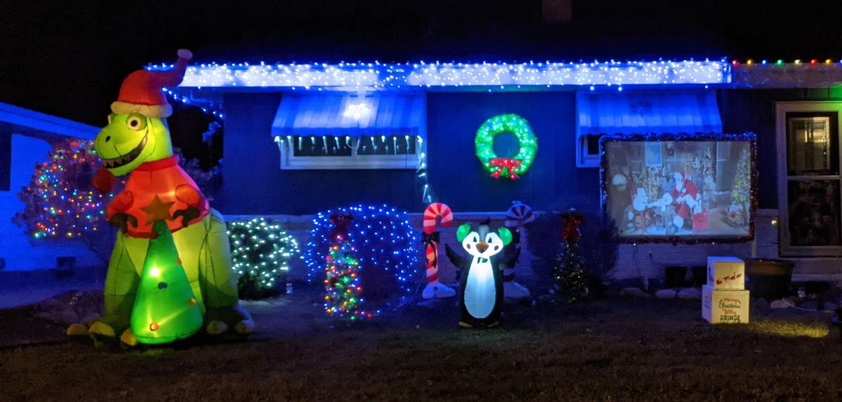 2020 xmas lights northside dinosaur and video screen.jpg