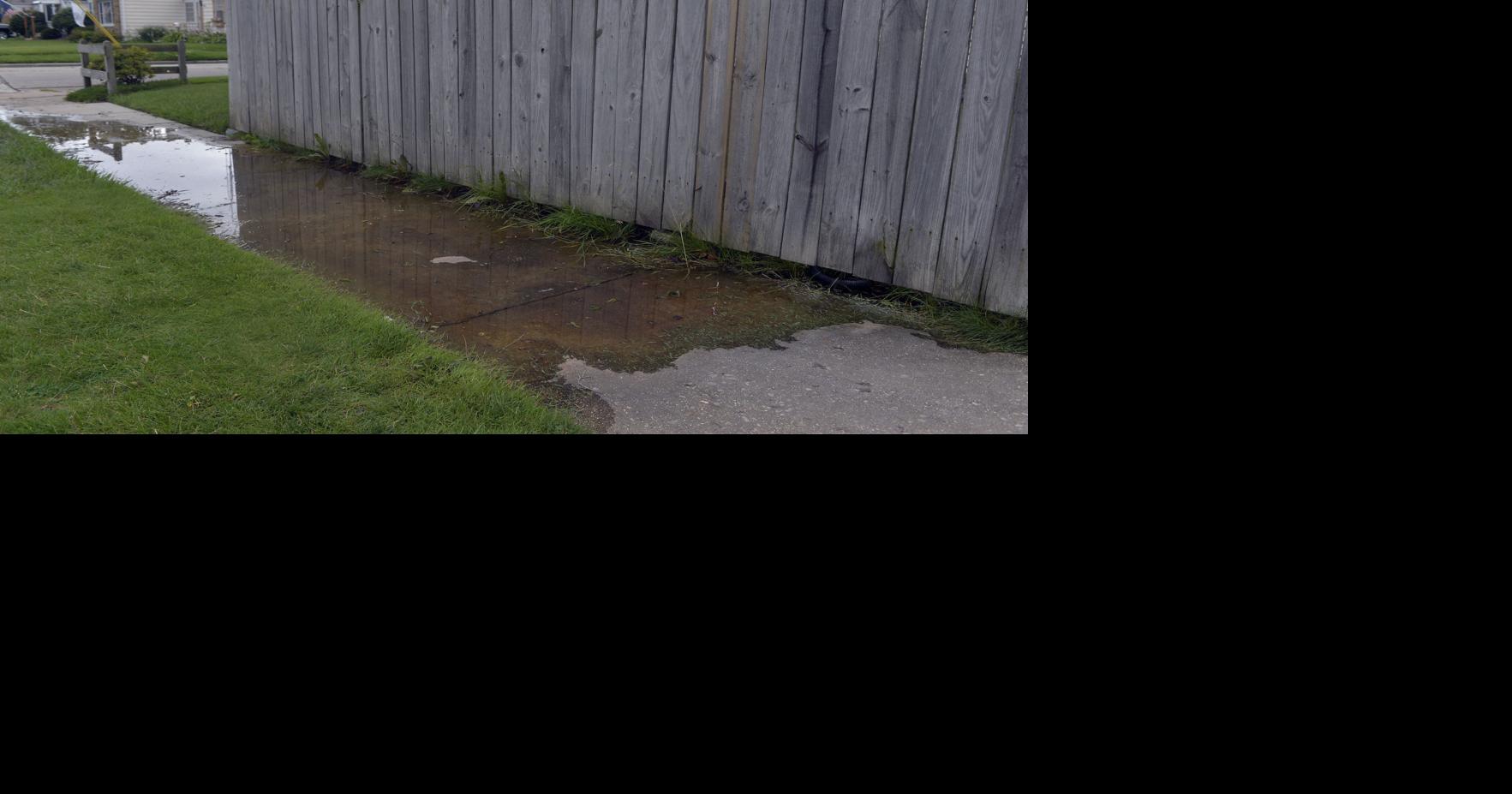 Fix It Sump pump discharge causes slippery sidewalk