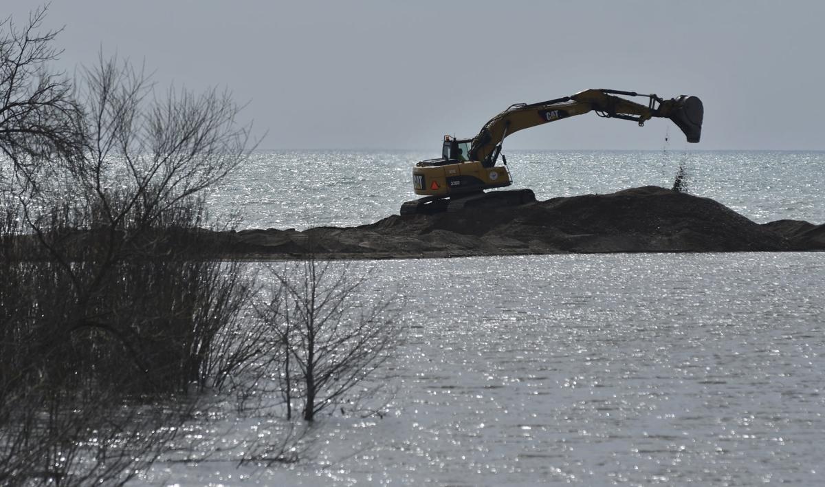 Crews work to restore mouth of Pike River Local News