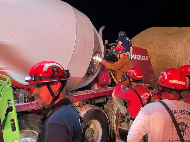 Man rescued from concrete mixing drum 3