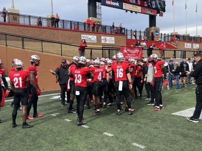 WKU Hilltoppers players take the field to warm-up prior to Saturday's home game
