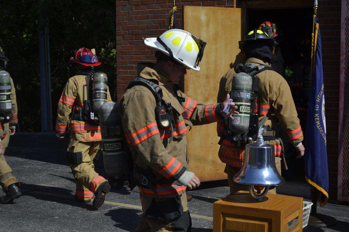 Remembering 9/11 Firefighters climb tower in honor of first-responders ...