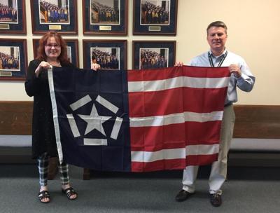 shot of flag and patrons