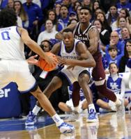 Kentucky knocks off first-place Texas A&M for third straight win