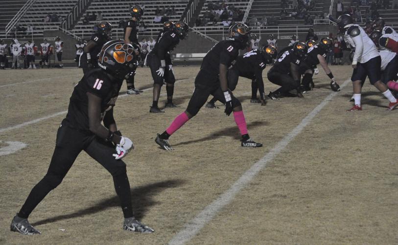 Hopkinsville Tigers players prior to a snap during a home game earlier this season