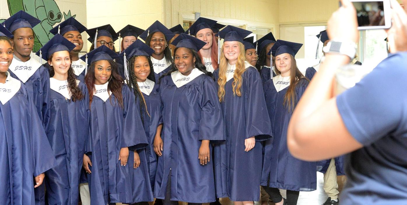 Jones High School seniors take one last trip to elementary school