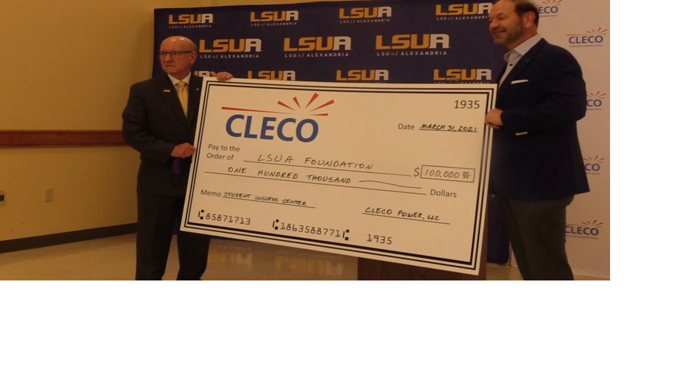 Cleco CEO,Bill Fontenot presented a 100,000 check to LSUA Chancellor
