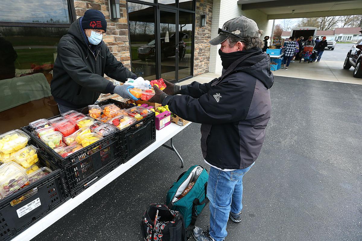 Food pantries grapple with challenges of serving in social distancing