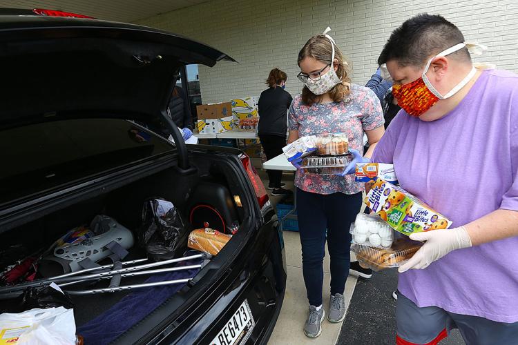 Food pantries grapple with challenges of serving in social distancing