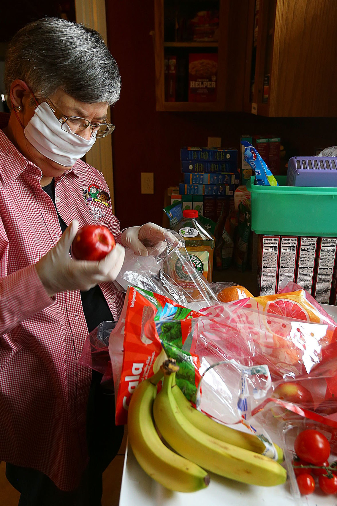 Food pantries grapple with challenges of serving in social distancing