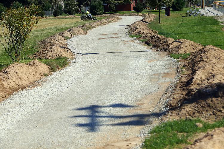 The path toward progress Russiaville building its first paved walking