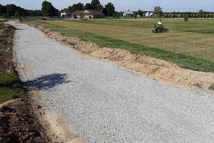 The path toward progress Russiaville building its first paved walking
