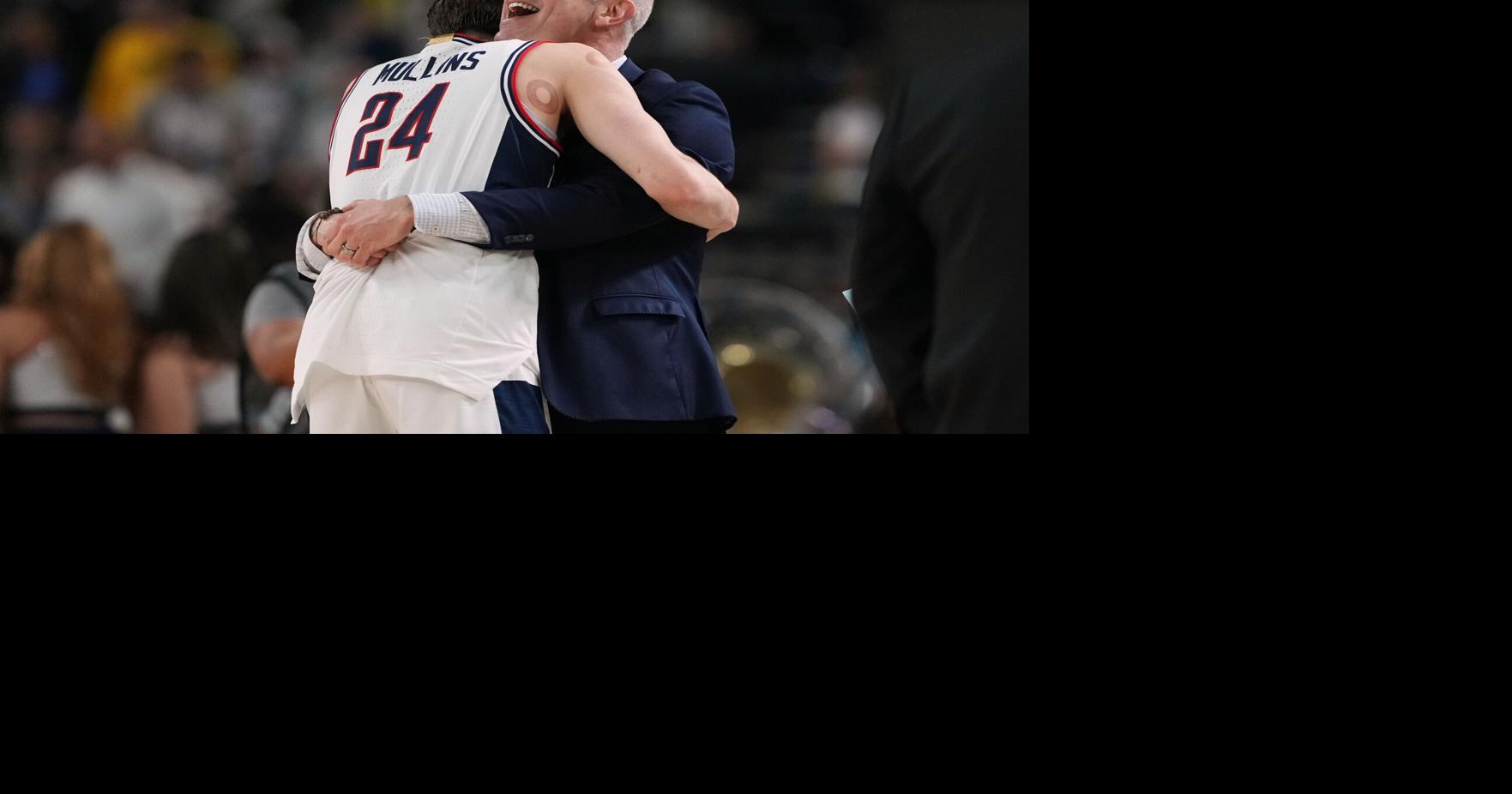 Mullins family shifts longtime allegiance from Michigan to UConn for championship game