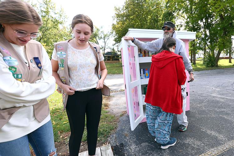 Girl Scout troop builds neighborhood food pantries News