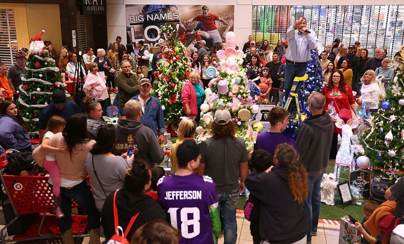 Holiday traditions return We Care TrimaTree auction brings in more than 84k News