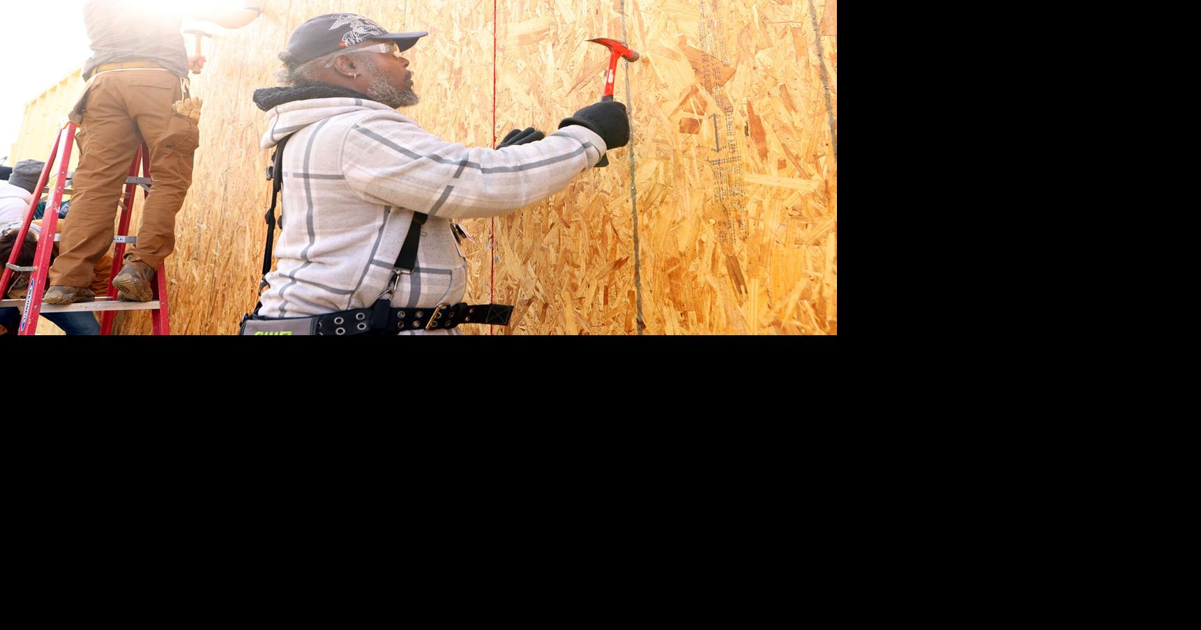 Habitat for Humanity building house for formerly homeless Marine