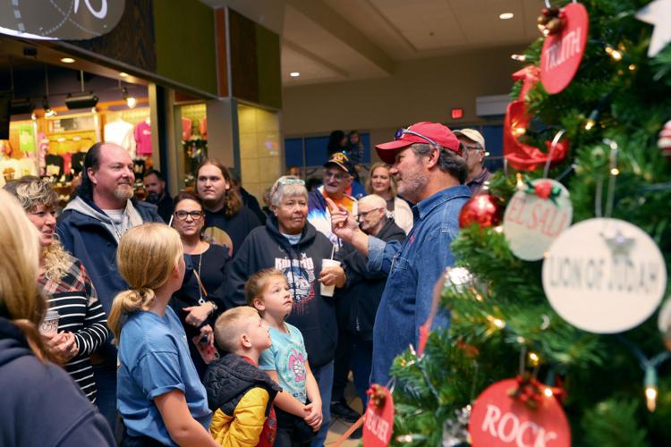 O Christmas tree: Annual tree auction raises $100K for We ...