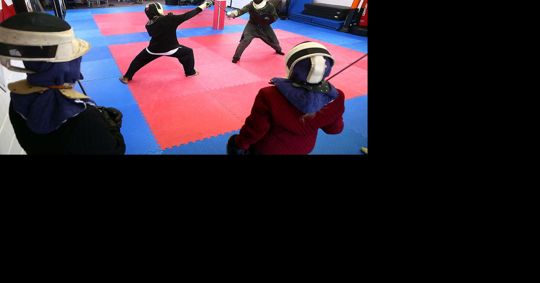 Students learn historic weapon fighting in Kokomo martialarts studio