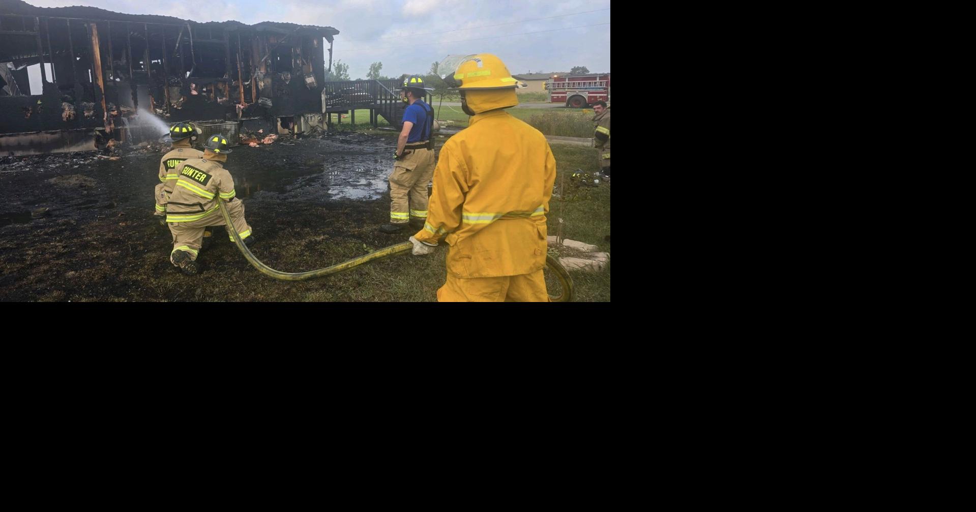 Several fire departments battle early morning house fire in ...