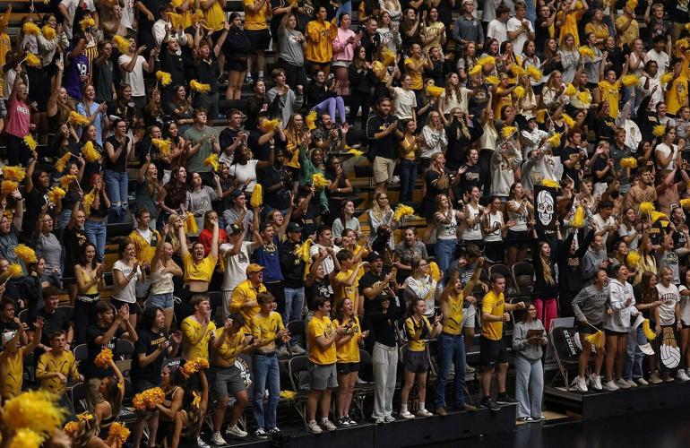 Fans cheer after a point for Mizzou volleyball in the third set of the match against Stanford on Tuesday
