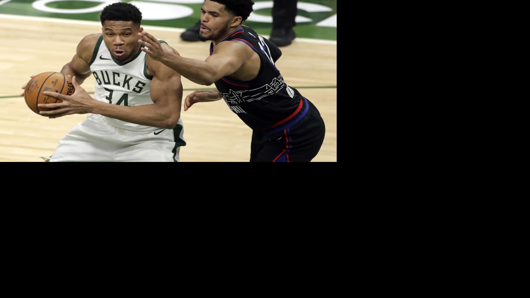 Bucks shoot 55.6% from the field, hold off 76ers