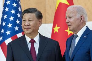 Xi accuses US of trying to hold back China's development