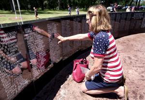 WATCH NOW: City unveils new Vietnam Memorial which was spearheaded by recent Holmen grad