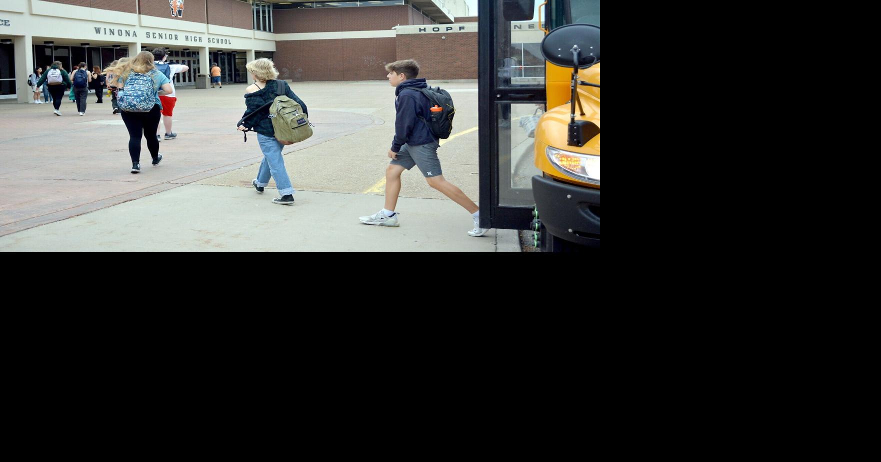 Students step off the bus