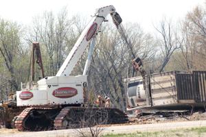 Crews work around the clock to clear derailed BNSF train near De Soto; four crew members released from hospital