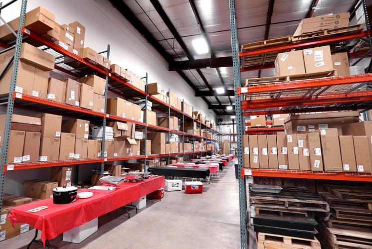 Supply store celebrates expansion with open house