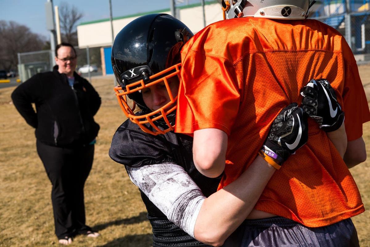Snubbed by one team, Transgender football player feels at home at last