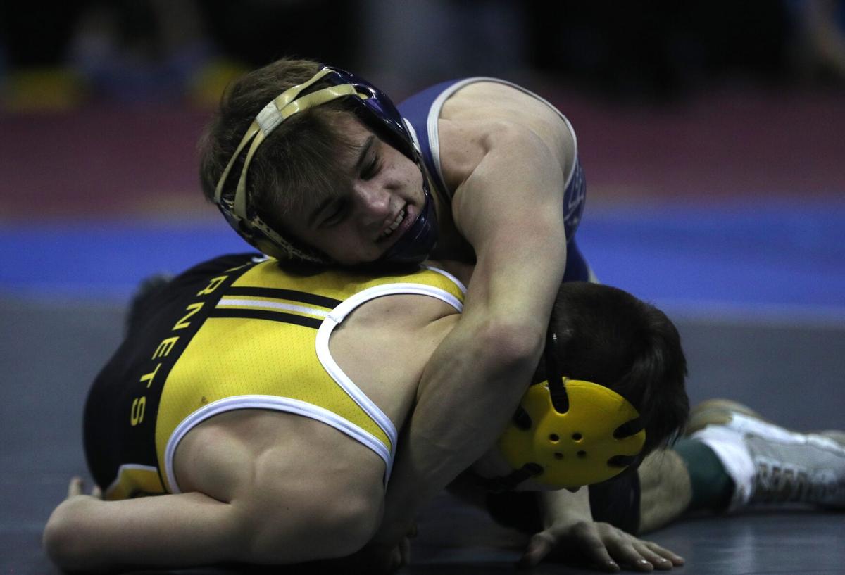 Local Sports: Monroe wrestlers bring home tournament title