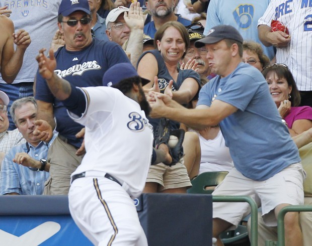 Berkman lifts Cardinals over Brewers in heated 11-inning game