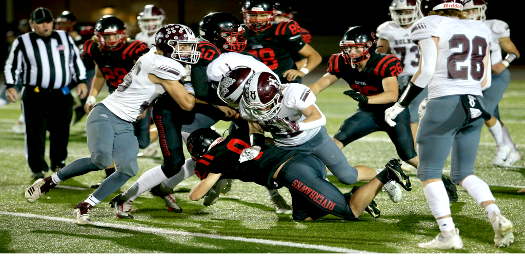 IN PHOTOS Central vs. Holmen football