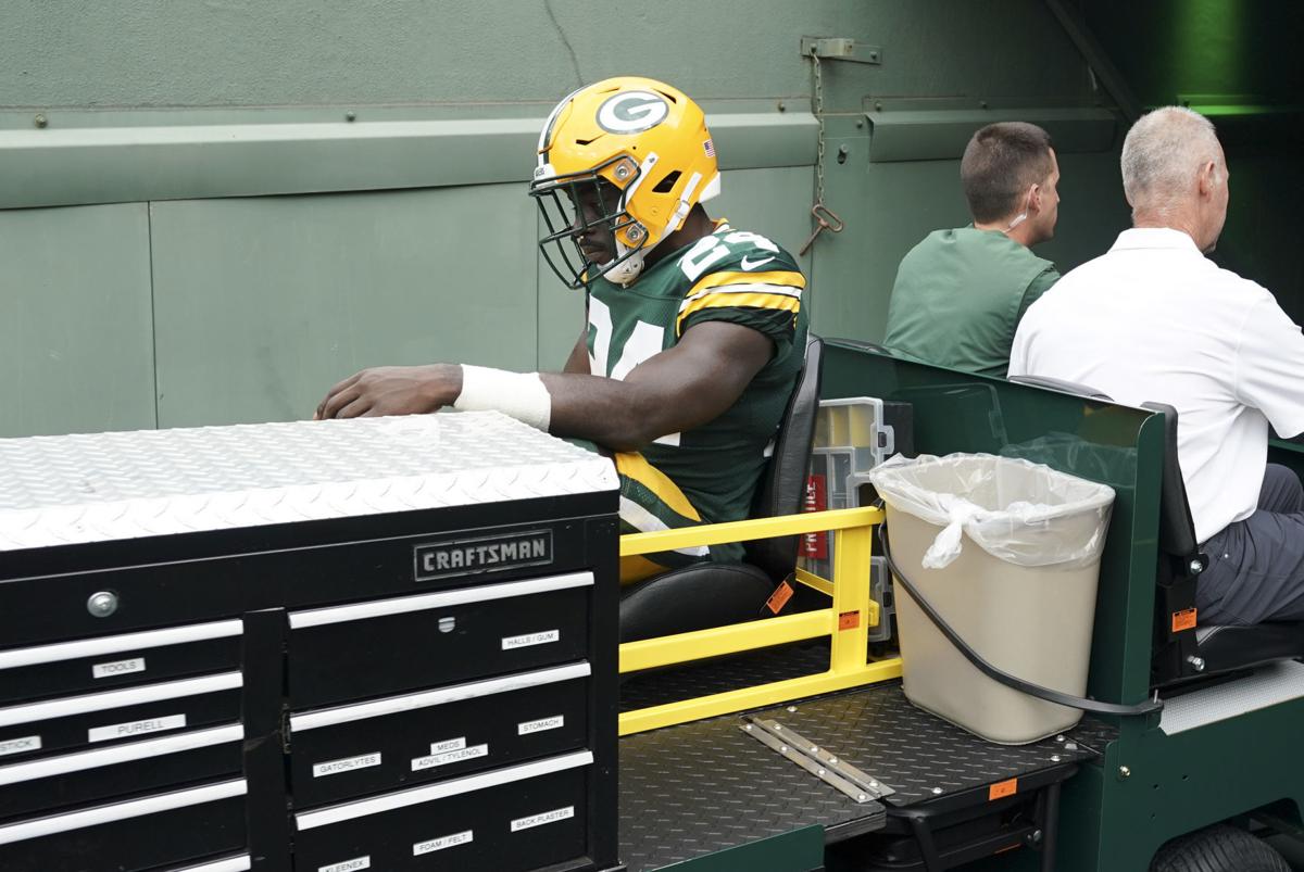 Captains patches are sewn to Packers jerseys