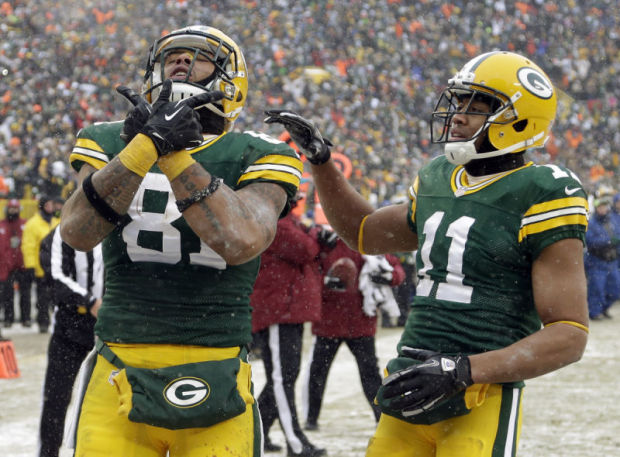 Green Bay Packers tight end Andrew Quarless (81) celebrates at the