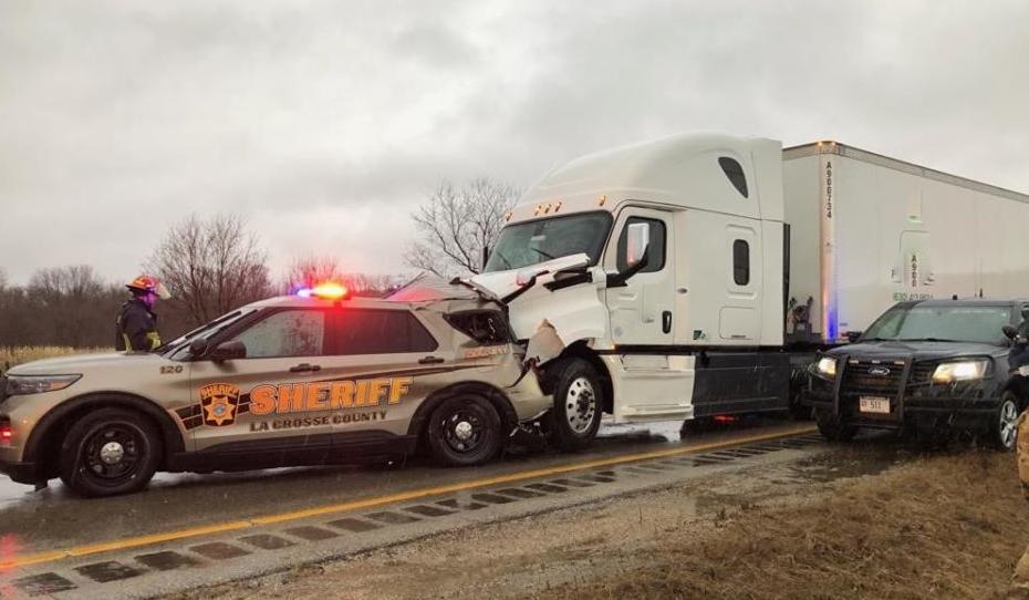 Semi strikes La Crosse County deputy's vehicle along Interstate 90