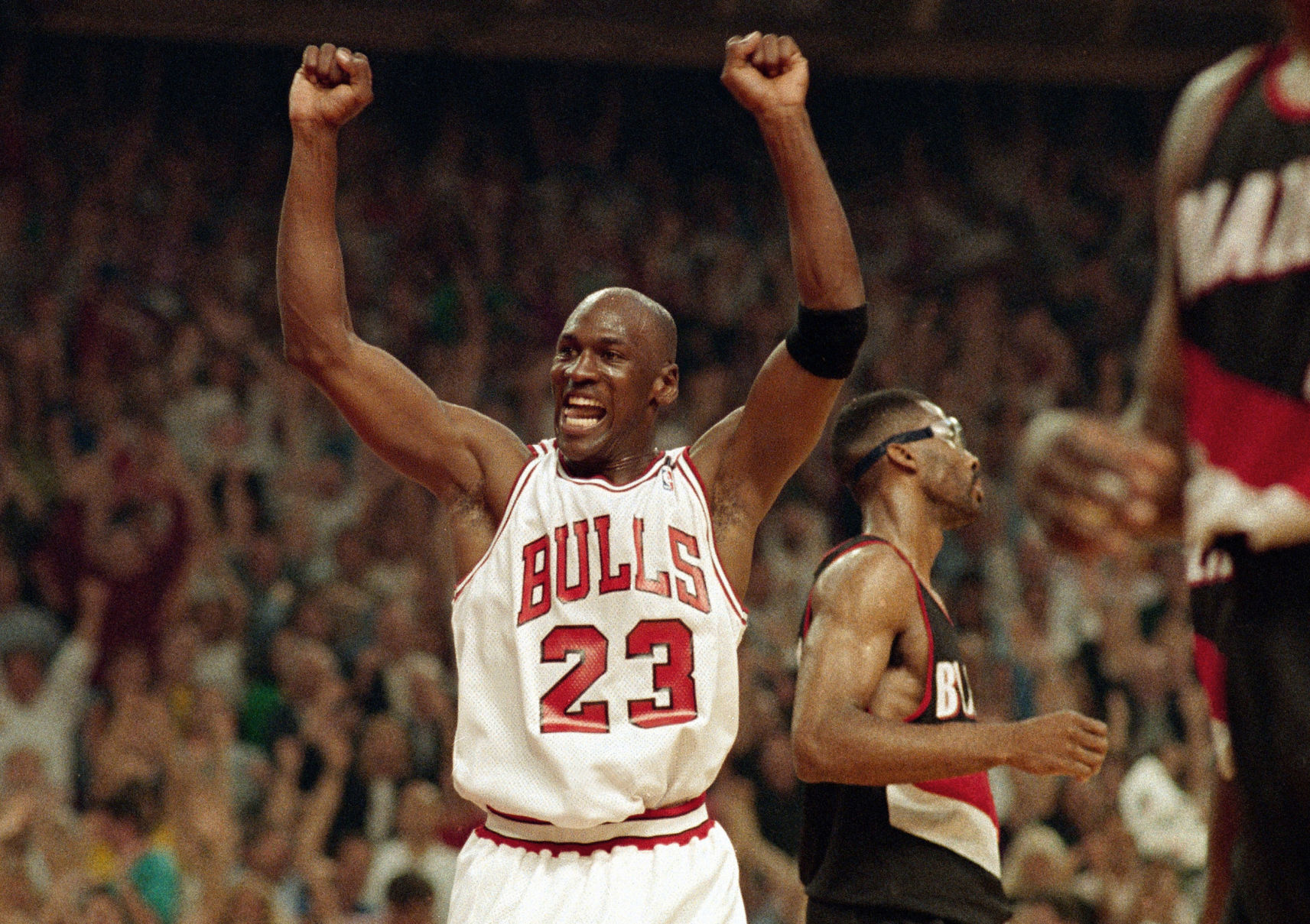 michael jordan palming a basketball